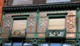 Windows with peacock feather motif on Art Nouveau building on rue des Grandes Arcades. Strasbourg, France.