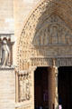Right Gothic portal of Notre Dame Cathedral. Paris, France.