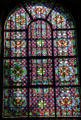 Early-style stained glass window at St-Germain-des-Prés. Paris, France.