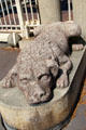 Sculpted dog guarding gates at Mobilier National workshops. Paris, France.