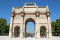 Arc du Triomphe du Carrousel with pink columns surmounted with Napoleonic troops in uniforms of four functions. Paris, France.