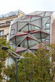 Faceted window wall of former Citroen auto showroom on Champs Elysees. Paris, France.