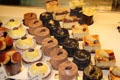 Rows of crème & chocolate deserts. Paris, France.