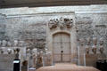 Ancient wall original to site with collection of portrait heads of kings found at Notre Dame of Paris at Cluny Museum. Paris, France.