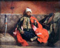 Turk Smoking Seated on a Divan painting by Eugène Delacroix at Louvre Museum. Paris, France.