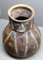 Glazed earthenware pitcher with human face from Lyon at Sèvres National Ceramic Museum. Paris, France.