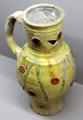 Glazed earthenware pitcher with circles from Paris at Sèvres National Ceramic Museum. Paris, France.