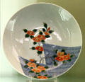 Japanese porcelain Nabeshima-style plate from Arita at Sèvres National Ceramic Museum. Paris, France.