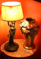 Art Nouveau lamp & vase at Maxim's Art Nouveau Collection 1900. Paris, France.