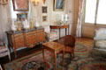 Sideboard & writing table in bedroom at Nissim de Camondo Museum. Paris, France.