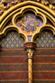 Gothic shapes painted with bright colors at St Chapelle. Paris, France.