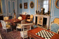 Backgammon table attributed to Jean-Henri Riesener & other period furniture in Blue room Louis XVI at Carnavalet Museum. Paris, France.