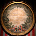 Framed fragment of banner commemorating first national celebration of French Revolution at Carnavalet Museum. Paris, France.