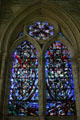 Stained glass window set in stone frame at Cathédrale St-Pierre. Beauvais, France.