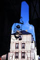 Half-timbered building & shop sign for clocks. Vannes, France.