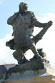 Statue of Jacques Cartier at tiller of his ship, La Grande Hermine. St Malo, France.