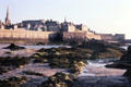 Town & walls seen from beach. St Malo, France.