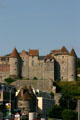 Dieppe Castle built with alternate blocks of flint & sandstone standing above Les Tourelle old city gates & town. Dieppe, France.
