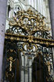 Ornate wrought iron & gilded gate at Amiens Cathedral. Amiens, France.
