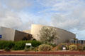 Facade of Juno Beach Centre covered by Titanium scales. Courseulles-sur-Mer, France.