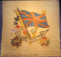 Onward to Victory Canadian WWII printed cushion cover at Juno Beach Centre. Courseulles-sur-Mer, France.