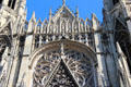 Flamboyant Gothic rose window exterior details of St-Ouen Abbey Church. Rouen, France.