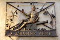Iron wall sign of A l'Homme Armé at Wrought Iron Museum. Rouen, France.