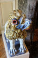 Rouen-made earthenware lion painted blue, yellow & red at Rouen Ceramic Museum. Rouen, France.