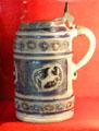 Stoneware covered tankard with horse design in Great Hall at Château de Clos Lucé. Amboise, France.