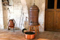 Coquemar copper warm water kettle & drinking fountain to filter water for drinking in kitchen at Chambord Chateau. Chambord, France.