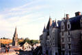 Langeais Chateau with town & spire of Saint-Jean -Baptiste church. Langeais, France