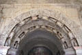 Carved arch within cloister at Fontevraud Abbey. Fontevraud, France.