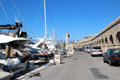 Profusion of yachts moored along walls of Old Port. Antibes, France.