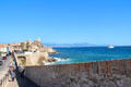 Sea front promenade along ramparts. Antibes, France.