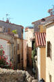 Narrow winding street in Old Antibes. Antibes, France.
