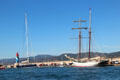 Harbor, lighthouse & sailing ships. St Tropez, France.