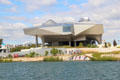 Elevated structure of Musée des Confluences above Saône River. Lyon, France