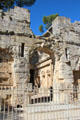 Entrance arch to Temple of Diana in Jardin de la Fontaine. Nimes, France