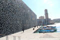 Random grill facade of MuCEM museum & Fanal tower. Marseille, France.