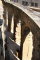 Arches ringing outer limits of seating area of Roman Theatre of Orange. Orange, France.