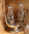 Glass cruets on silver stand at Orange museum of art & history. Orange, France.