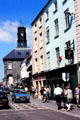 Kilkenny streetscape with city hall under octagonal clock tower, a former arcaded toll house. Ireland.
