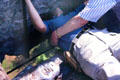 Kissing Blarney Stone at Blarney Castle requires leaning backwards over sharp drop. Ireland.