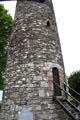 Doorway to round tower would normally be 15-20 feet above ground, but burials raised ground levels at Monasterboice. Ireland