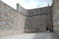 Cross marks spot where leaders of Irish Easter Rising were executed by the British in 1916 at Kilmainham Gaol. Dublin, Ireland.