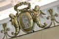 Pair of carved cherubs on English State Bed in tapestry room at Russborough House. Ireland.