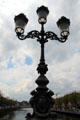 Cast iron lampstand on O'Connell Street bridge. Dublin, Ireland.