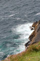 Steep drop into sea from Dingle Peninsula. Ireland.