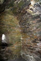 Interior with window opening of Gallarus Oratory on Dingle Peninsula. Ireland.