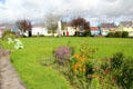 Lawn & flowers on North Square of Sneem. Sneem, Ireland.